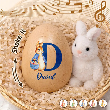 Custom Name With Bunny Holding An Egg Basket - Personalized Musical Wooden Easter Egg Shaker