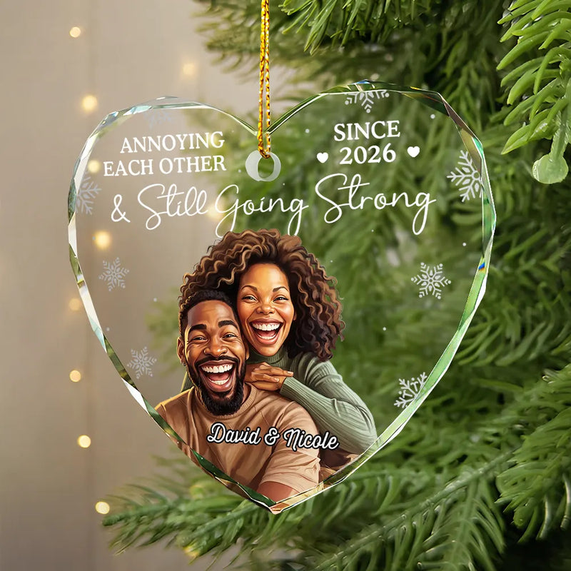 Art Design,Christmas,Humorous,Gift For Couples,Photo - Caricature - Remove BG - Custom Photo Caricature Annoying Each Other And Still Going Strong - Personalized Heart Shaped Glass Ornament